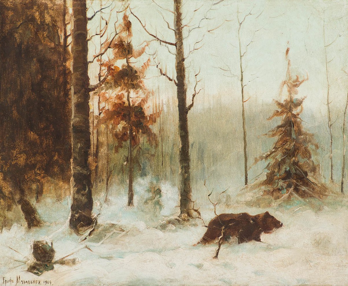 Медведь в зимнем лесу.